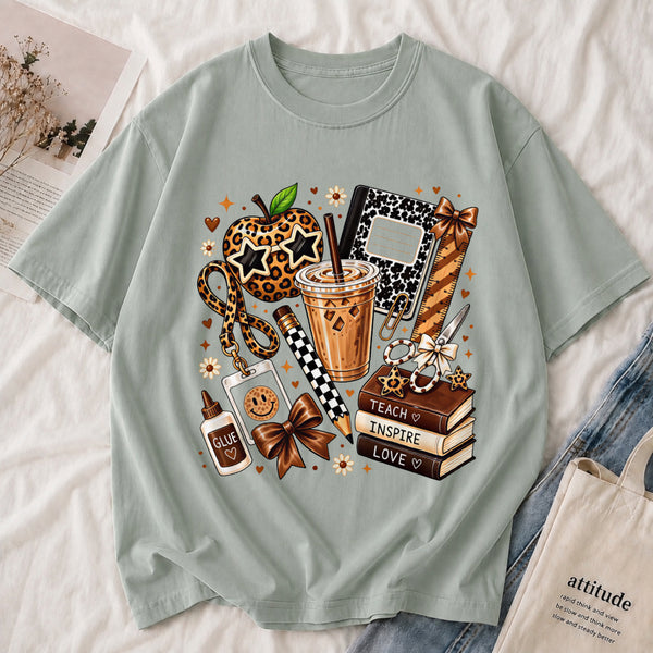Cozy Coffee & Books Tee shown on a model