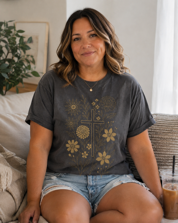 The Botanical Cross Tee shown on a model
