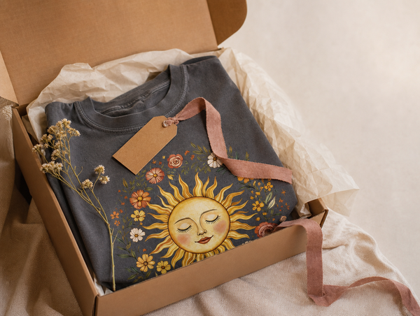 Vintage sunflower graphic tee gift-ready in a kraft box with cream tissue and dusty rose ribbon